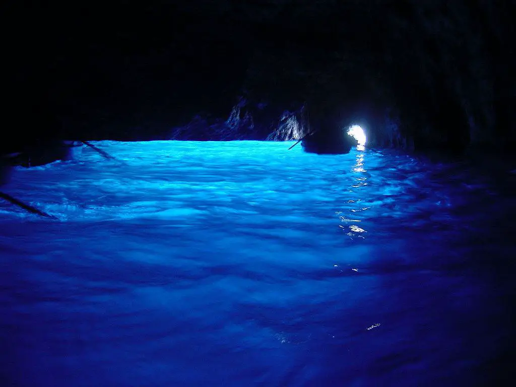 Blue glow in sea cave