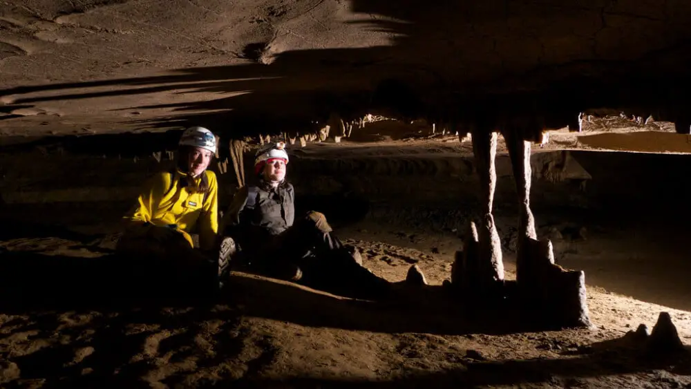 Soluble bed with two cavers resting