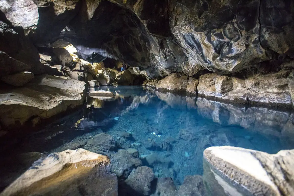 Horizontal shot of blue crystal water cave in Myvatn, Iceland